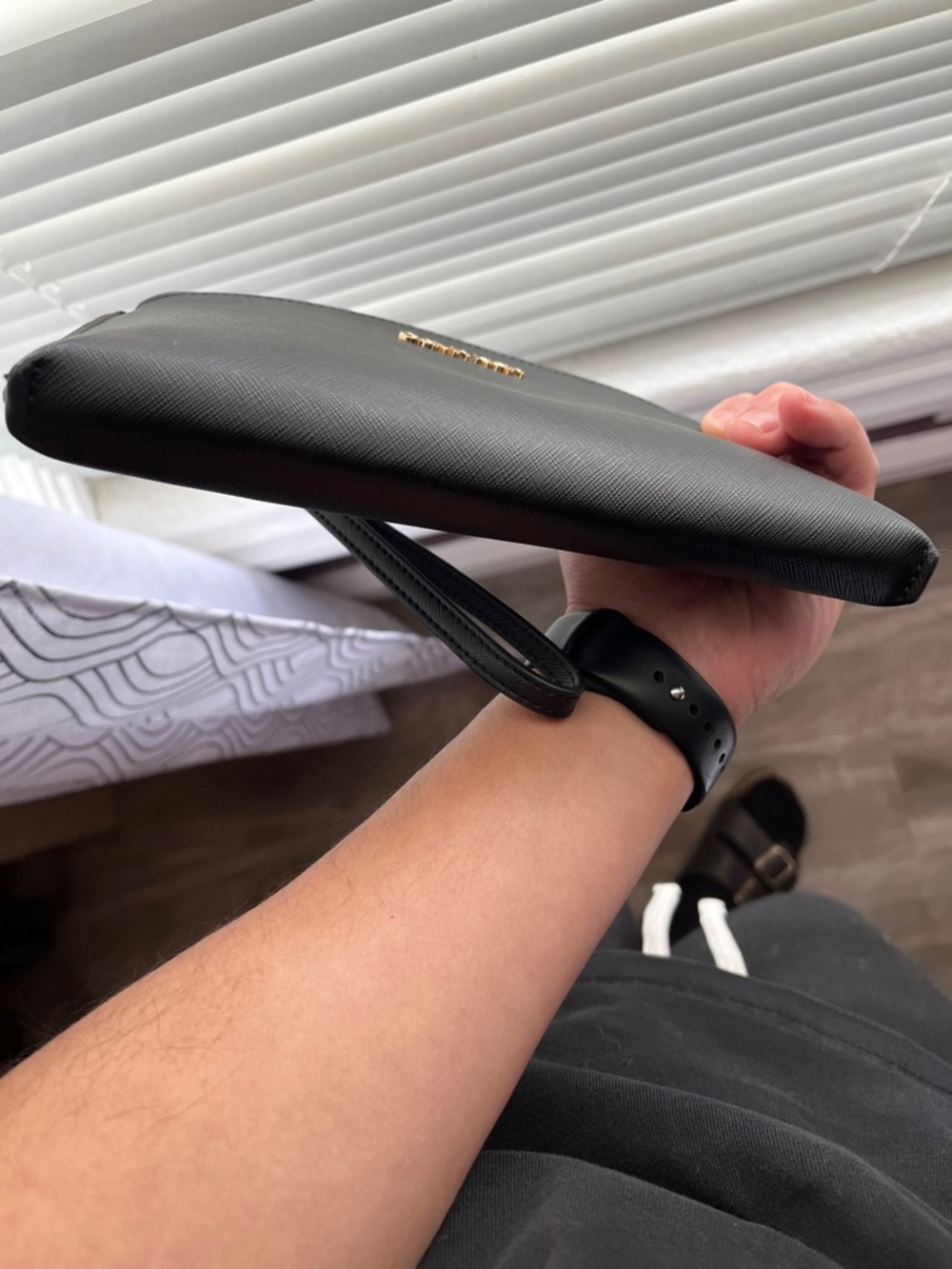 Calvin Klein Black Leather Wristlet with Gold Logo - Picture 9 of 11